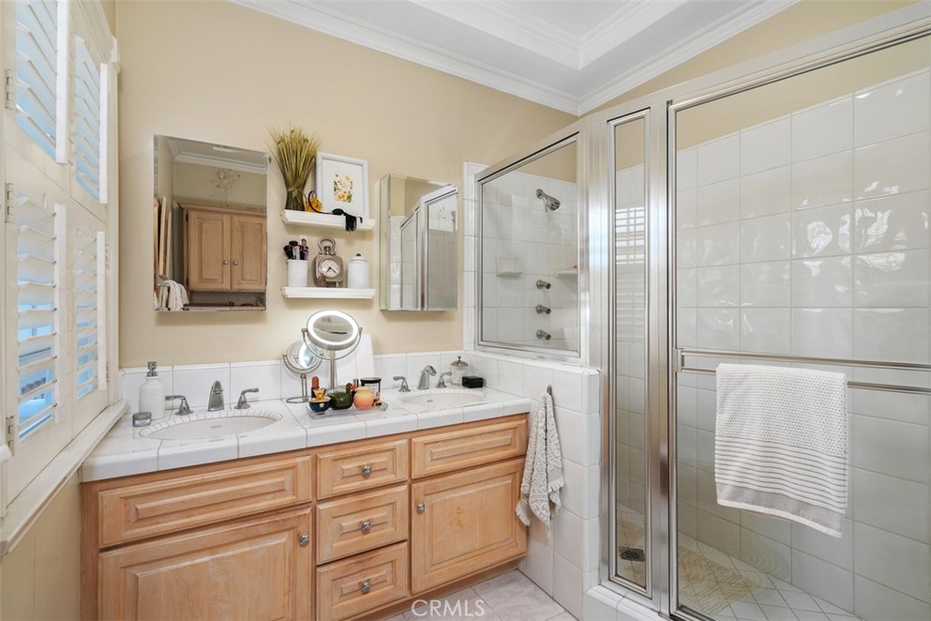 315 Old Ranch Road Sierra Madre, CA 91024 - Photo 20 of 42 a bathroom with a double vanity sink mirror and shower