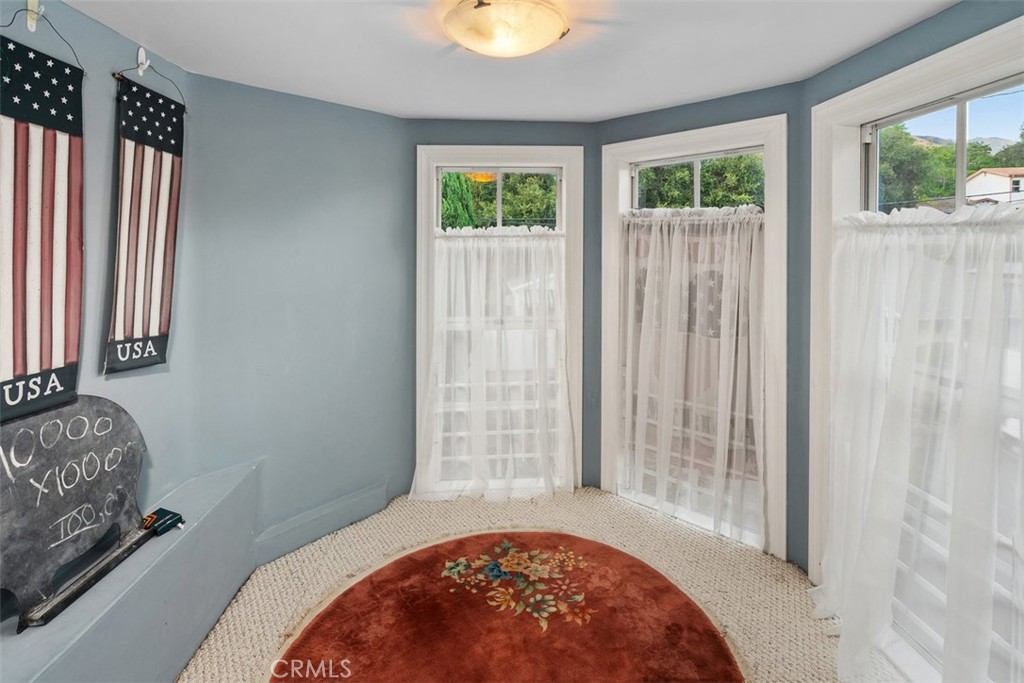 315 Old Ranch Road Sierra Madre, CA 91024 - Photo 22 of 42 a bedroom with a bed and a window