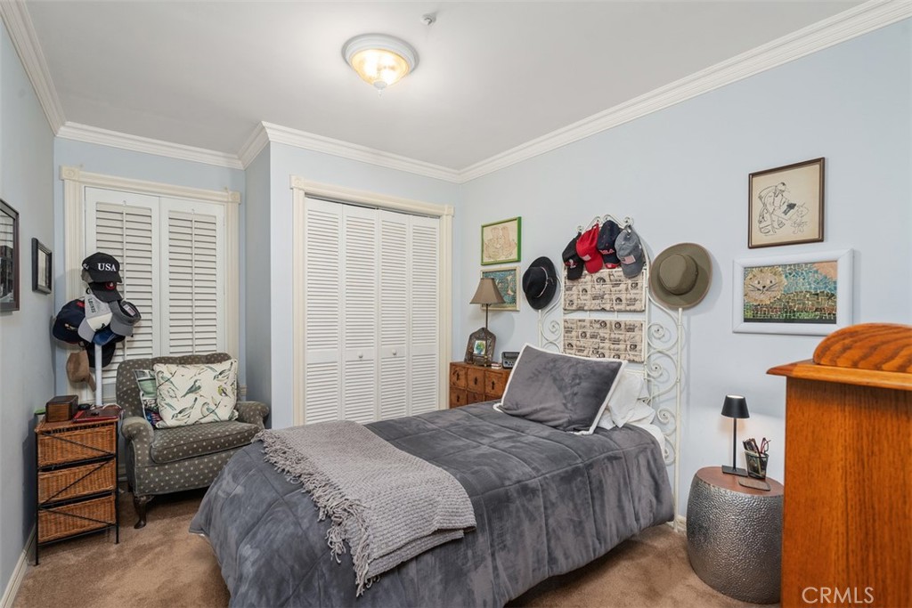 315 Old Ranch Road Sierra Madre, CA 91024 - Photo 26 of 42 a bedroom with bed and a window