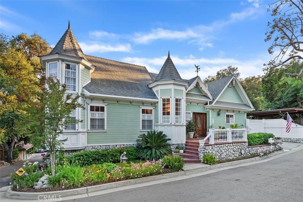 315 Old Ranch Road Sierra Madre, CA 91024 - Photo 4 of 42 front view of a house with a street
