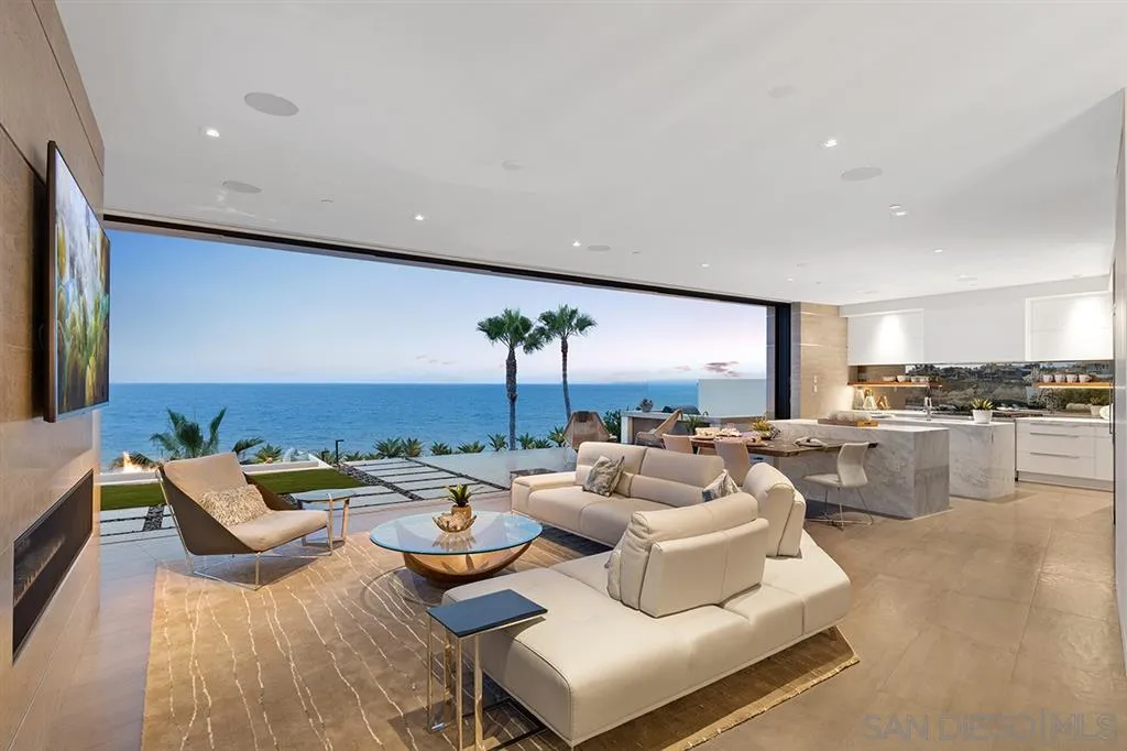 311 Sea Ridge Drive La Jolla, CA 92037 - Photo 4 of 25 a living room with furniture and view of kitchen