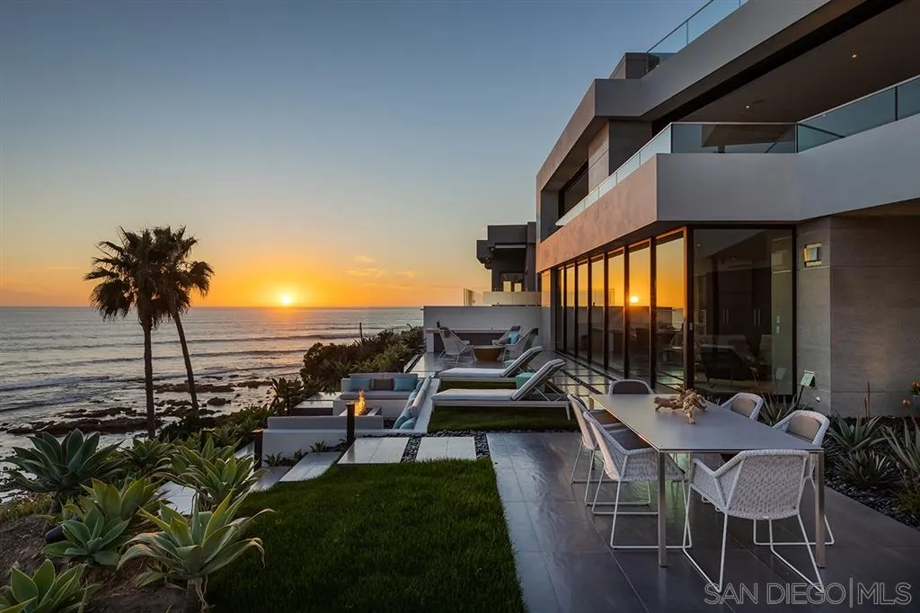 311 Sea Ridge Drive La Jolla, CA 92037 - Photo 8 of 25 a view of a patio with chairs and table of potted plants