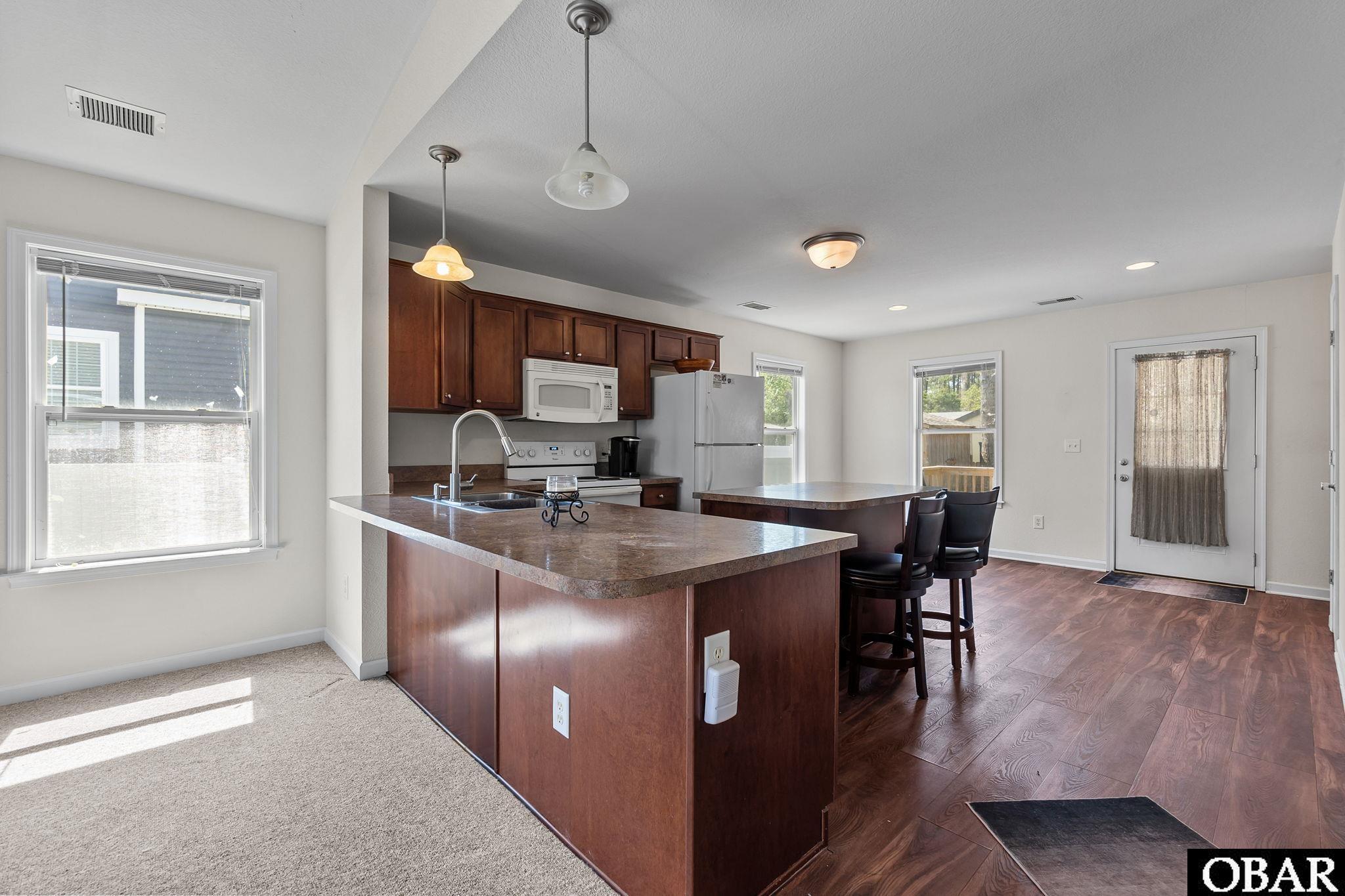 718 George Howe Street Manteo, NC 27954 - Photo 5 of 28 Kitchen & Dining