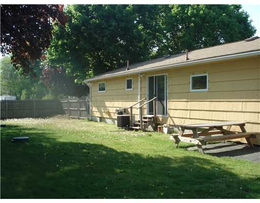 40 Vega Drive Warwick, RI 02886 - Photo 2 of 8 Exterior Back. Back yard is spacious and completely fenced in!