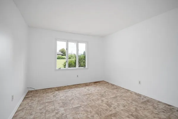 an empty room with a window