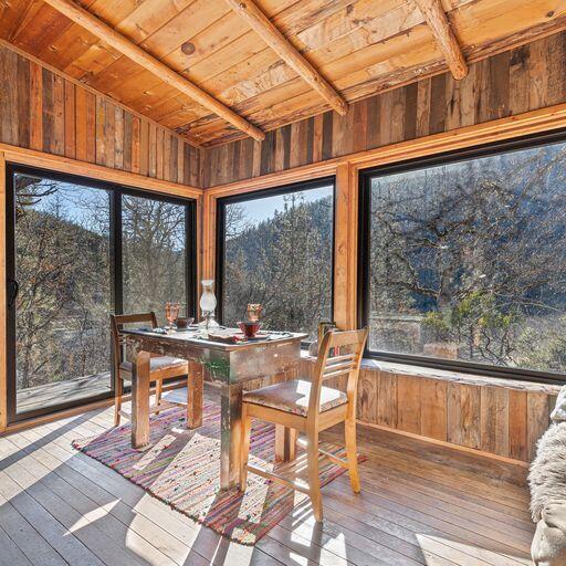 10000 Little Applegate Road Jacksonville, OR 97530 - Photo 95 of 141 a view of a chairs and table in the balcony