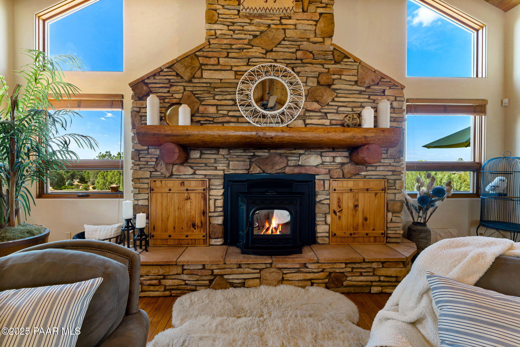 13995 North Thunderbird Road, Unit 74 Prescott, AZ 86305 - Photo 11 of 63 a living room with furniture and a fireplace