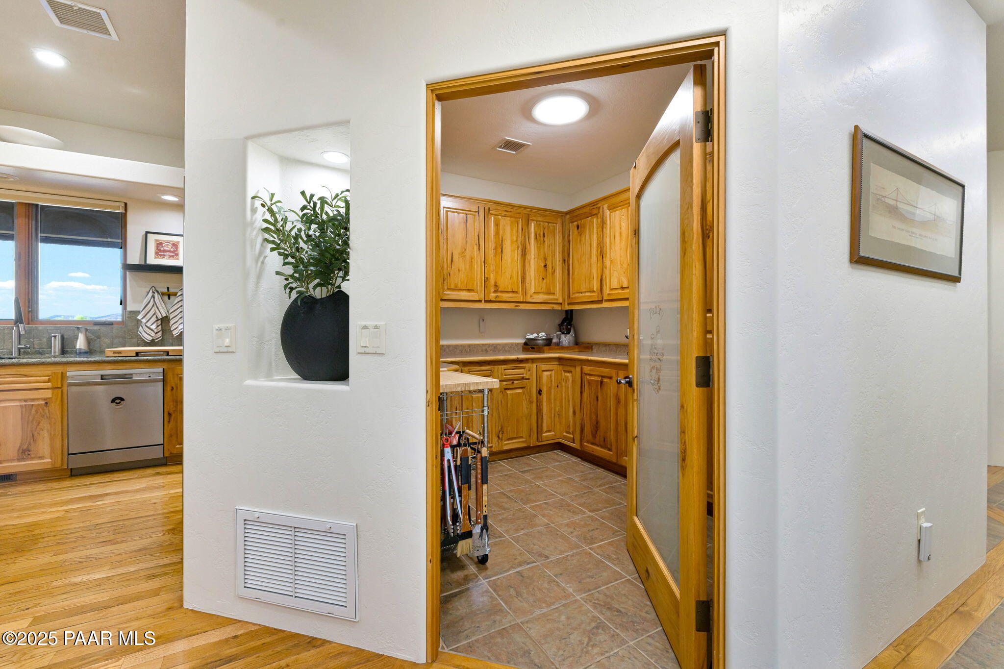 13995 North Thunderbird Road, Unit 74 Prescott, AZ 86305 - Photo 22 of 63 a kitchen with a refrigerator and a sink