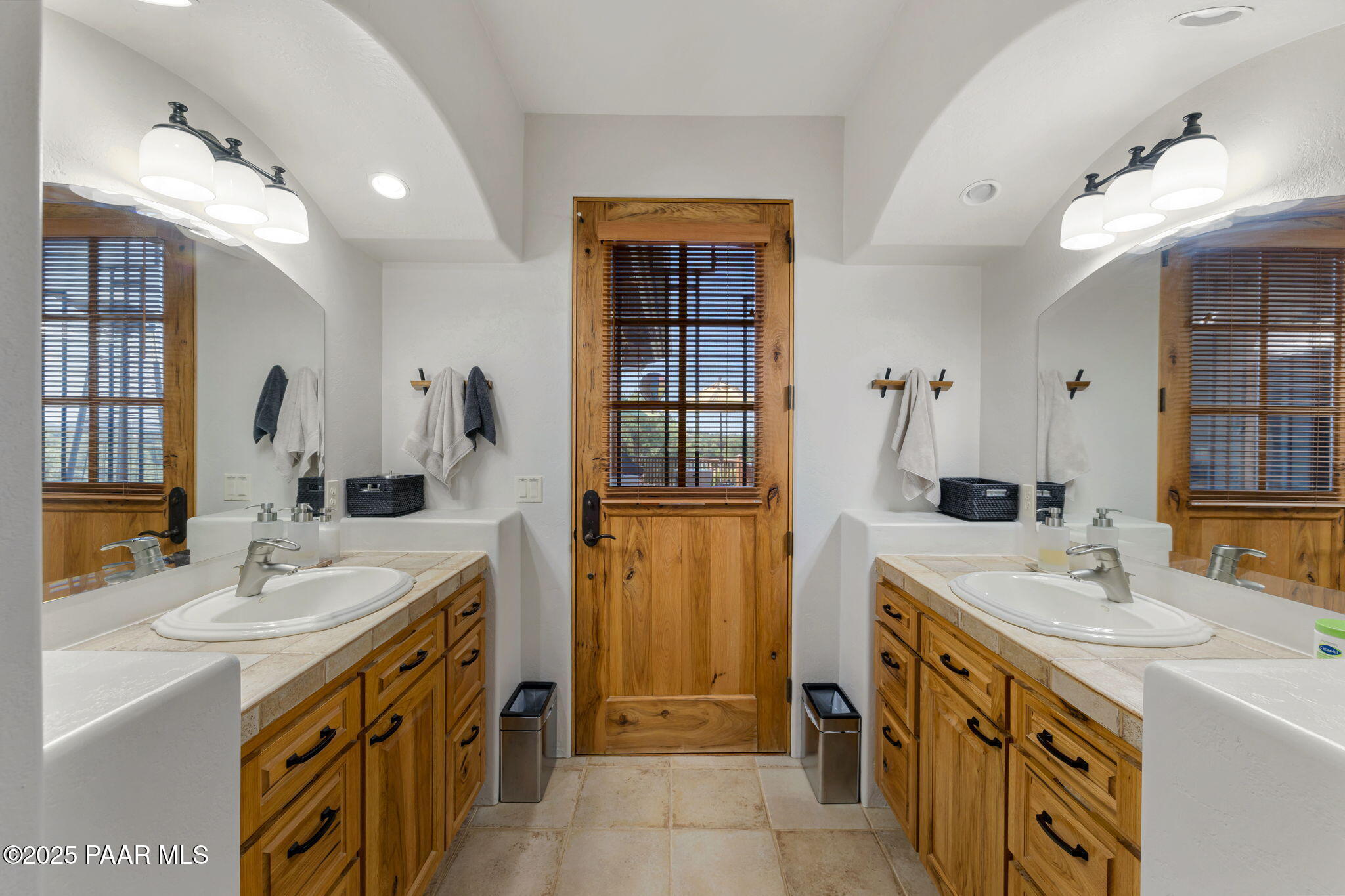 13995 North Thunderbird Road, Unit 74 Prescott, AZ 86305 - Photo 27 of 63 a spacious bathroom with a double vanity sink mirror and double