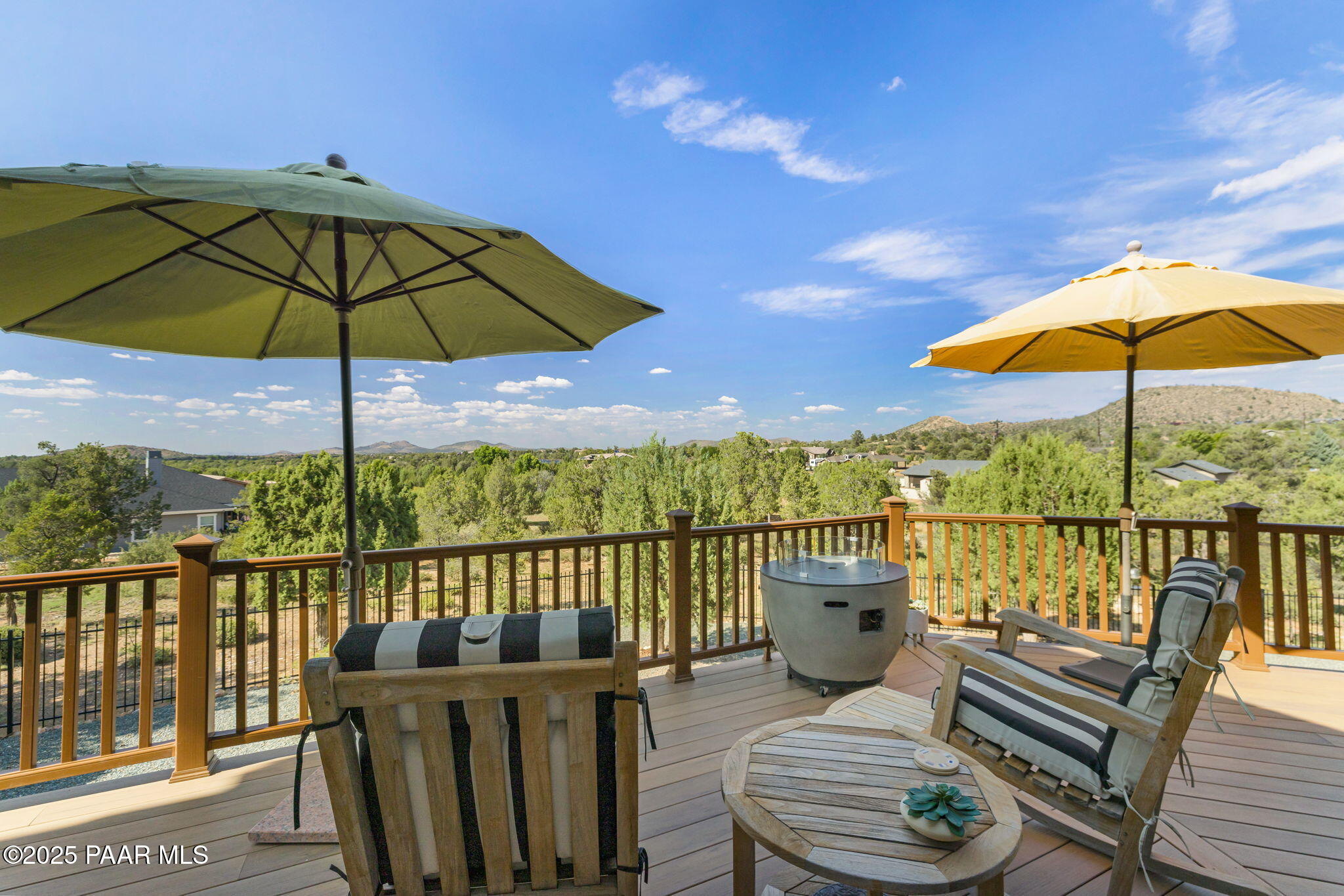 13995 North Thunderbird Road, Unit 74 Prescott, AZ 86305 - Photo 40 of 63 a view of a balcony with wooden floor and outdoor seating