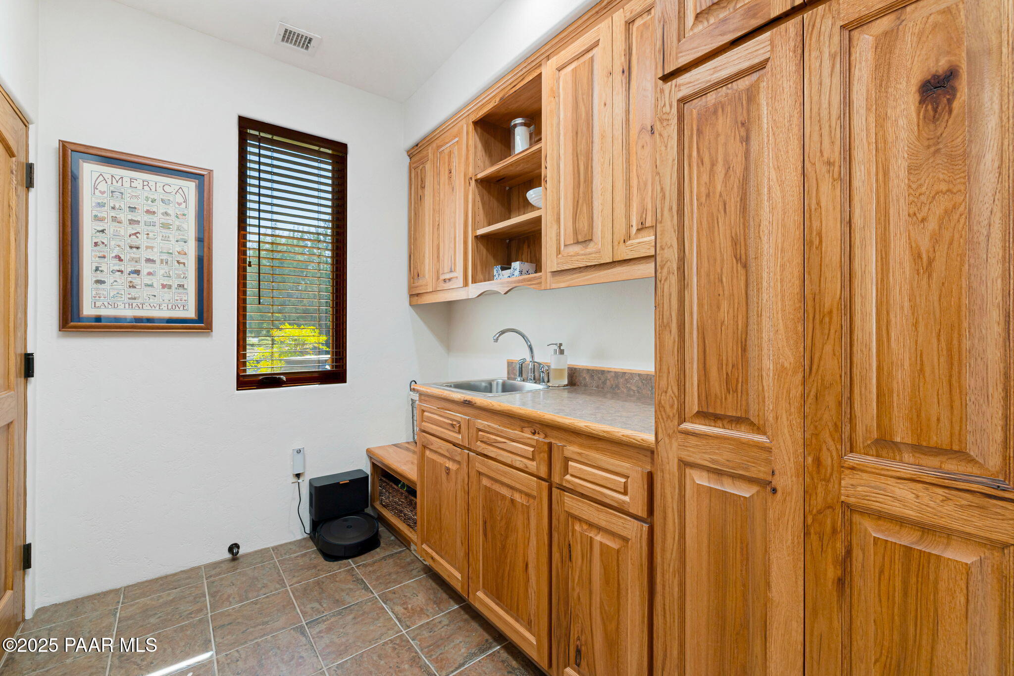 13995 North Thunderbird Road, Unit 74 Prescott, AZ 86305 - Photo 48 of 63 a bathroom with a sink and a mirror