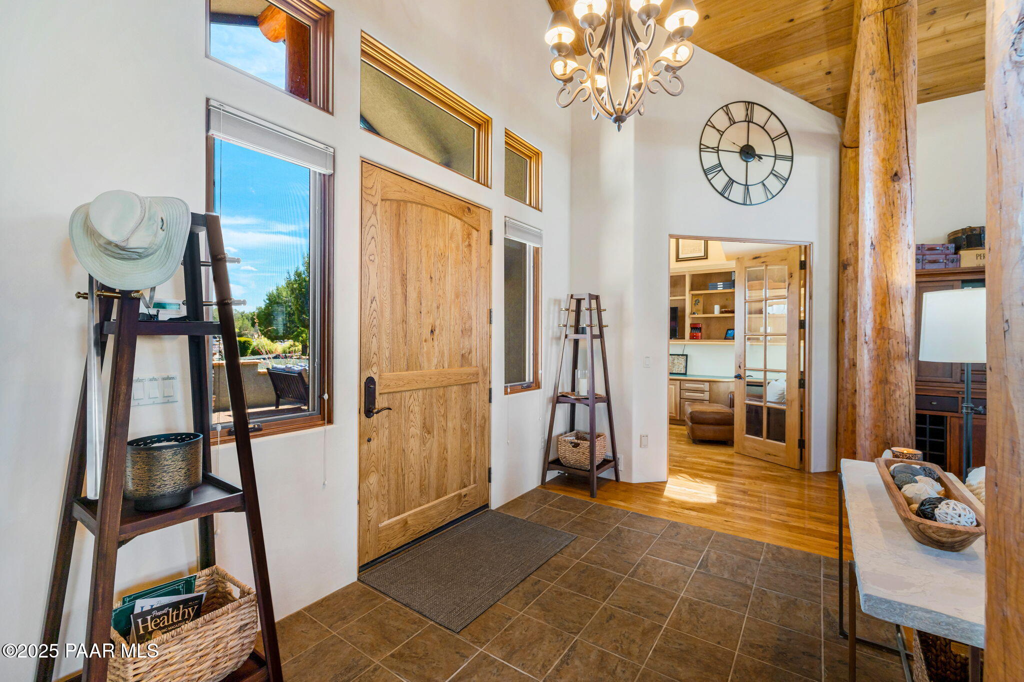 13995 North Thunderbird Road, Unit 74 Prescott, AZ 86305 - Photo 5 of 63 a view of a hallway with dining area and entryway