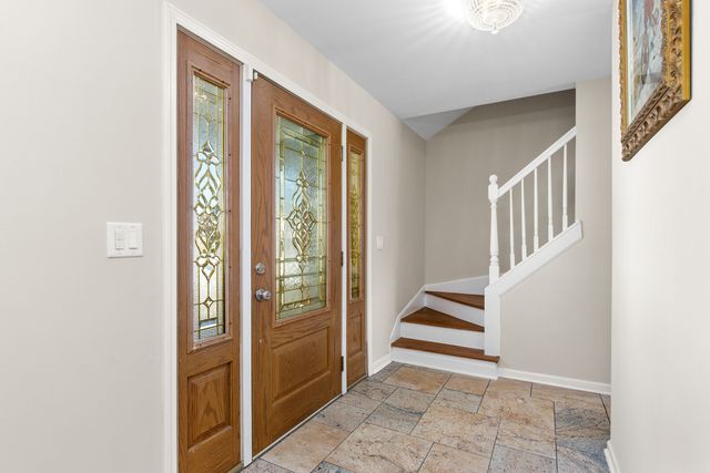 a view of an entryway with staircase