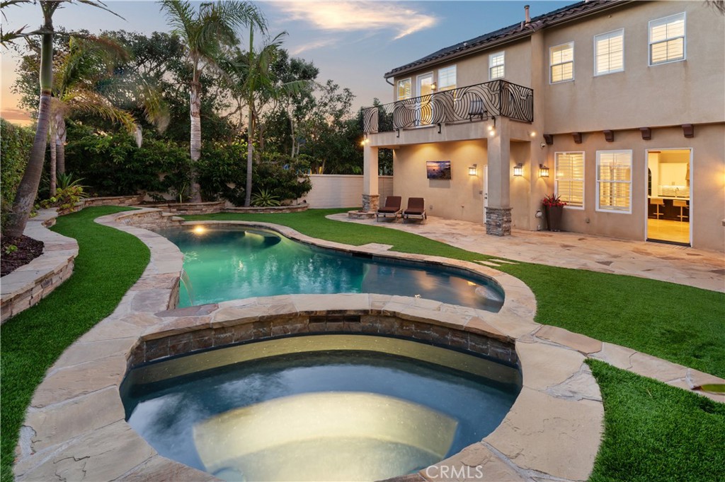 6572 Beachview Drive Huntington Beach, CA 92648 - Photo 15 of 17 a swimming pool view with a outdoor seating