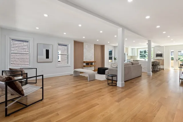 a living room with furniture and a table