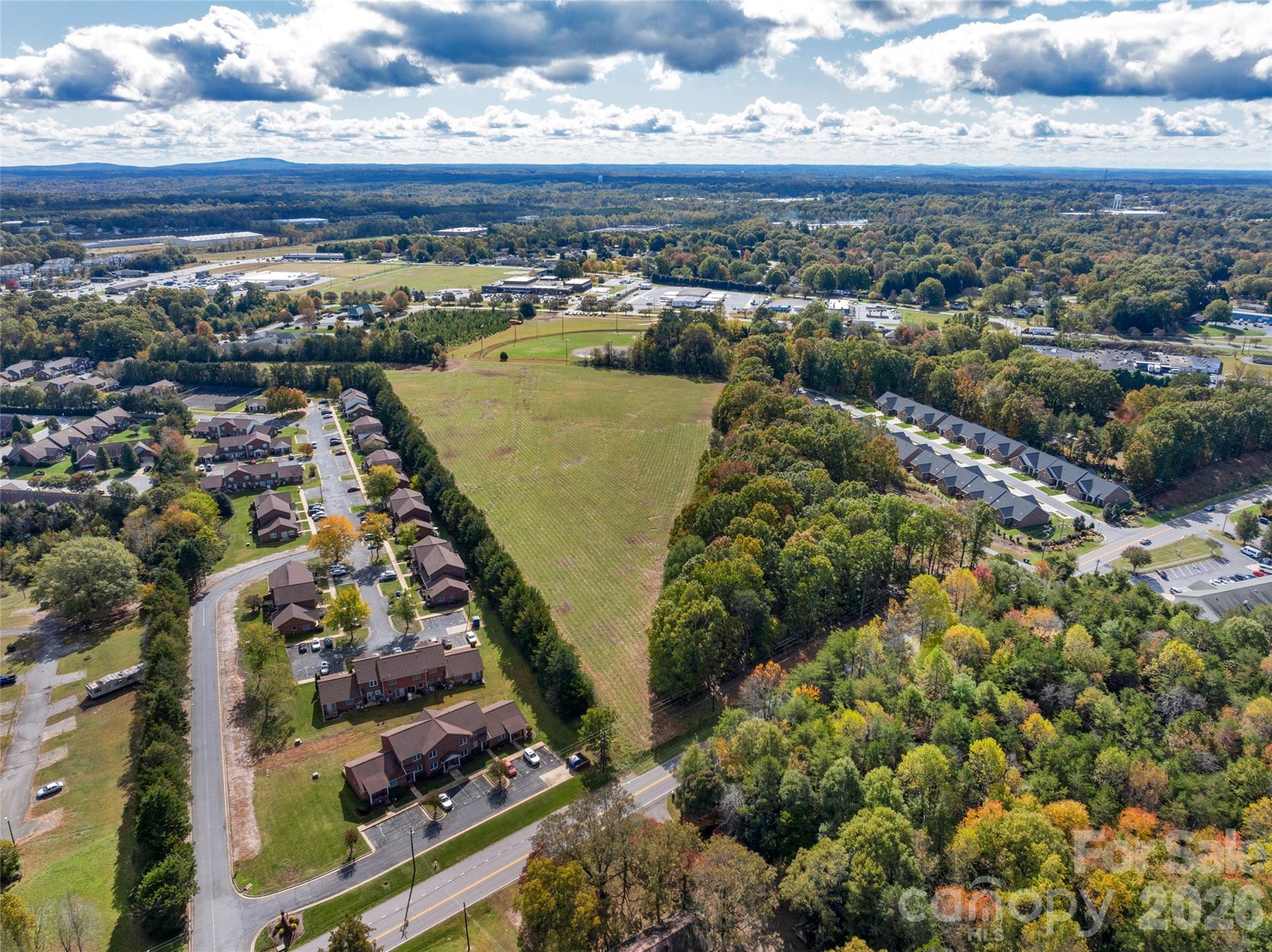 406 Rock Barn Road Northeast Conover, NC 28613 - Photo 5 of 10 a view of a lot of trees and houses