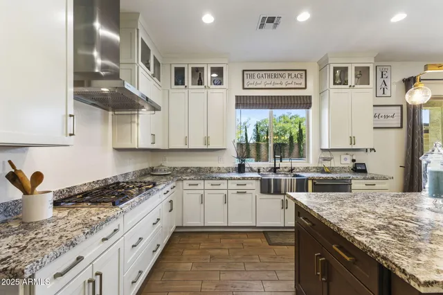 a living room with furniture and windows
