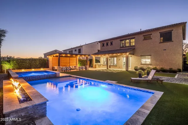 a view of swimming pool with outdoor seating