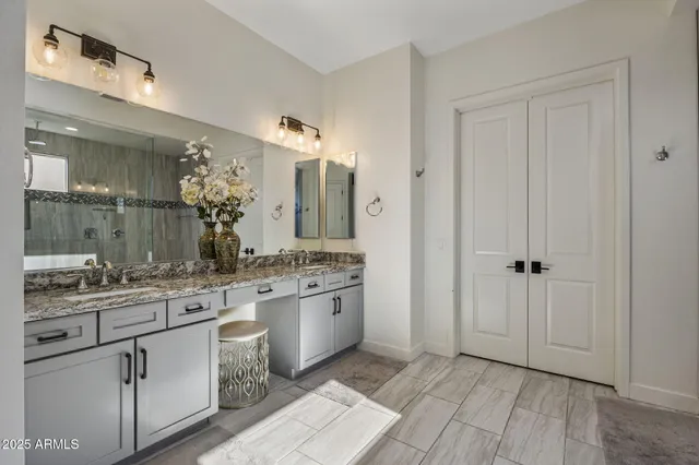 a bedroom with bed and a window