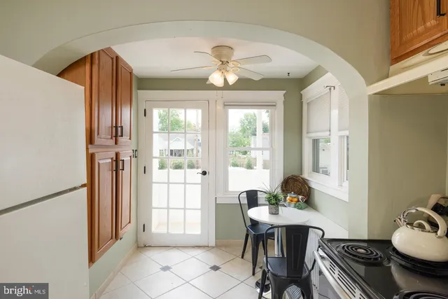 a workspace with furniture and window
