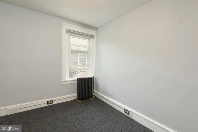 an empty room with window