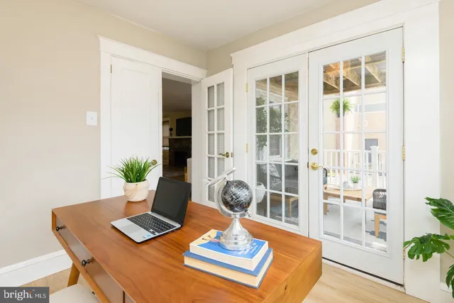 a workspace with furniture and wooden floor