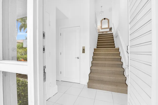 a view of entryway with stairs