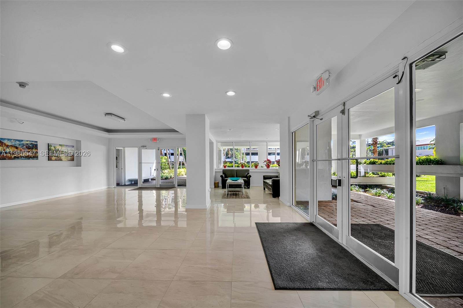 555 Crandon Boulevard, Unit 53 Key Biscayne, FL 33149 - Photo 17 of 23 a lobby with furniture and a view of living room