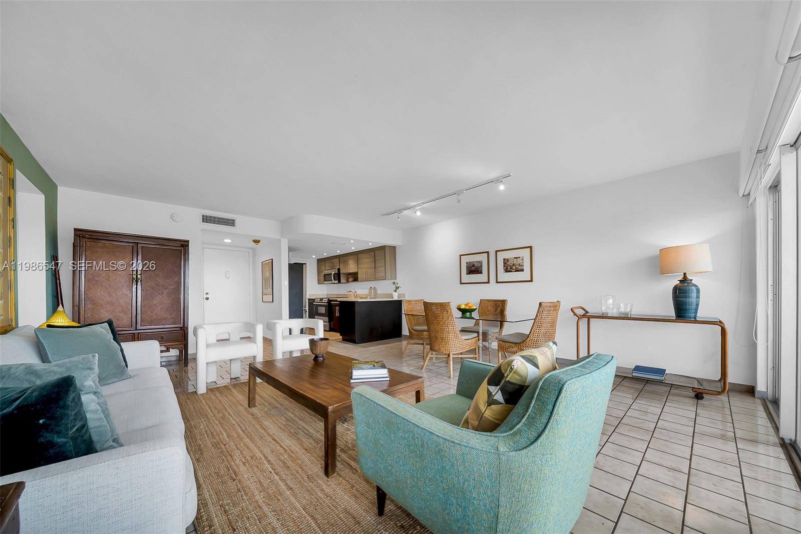 555 Crandon Boulevard, Unit 53 Key Biscayne, FL 33149 - Photo 3 of 23 a living room with furniture and a wooden floor