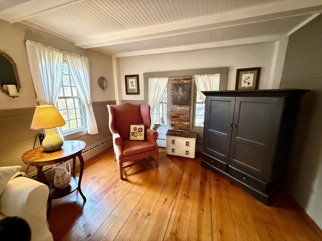 285 Brookfield Road Sturbridge, MA 01518 - Photo 14 of 42 a living room with furniture and a window