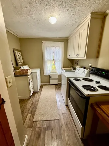 a view of a back yard of a house