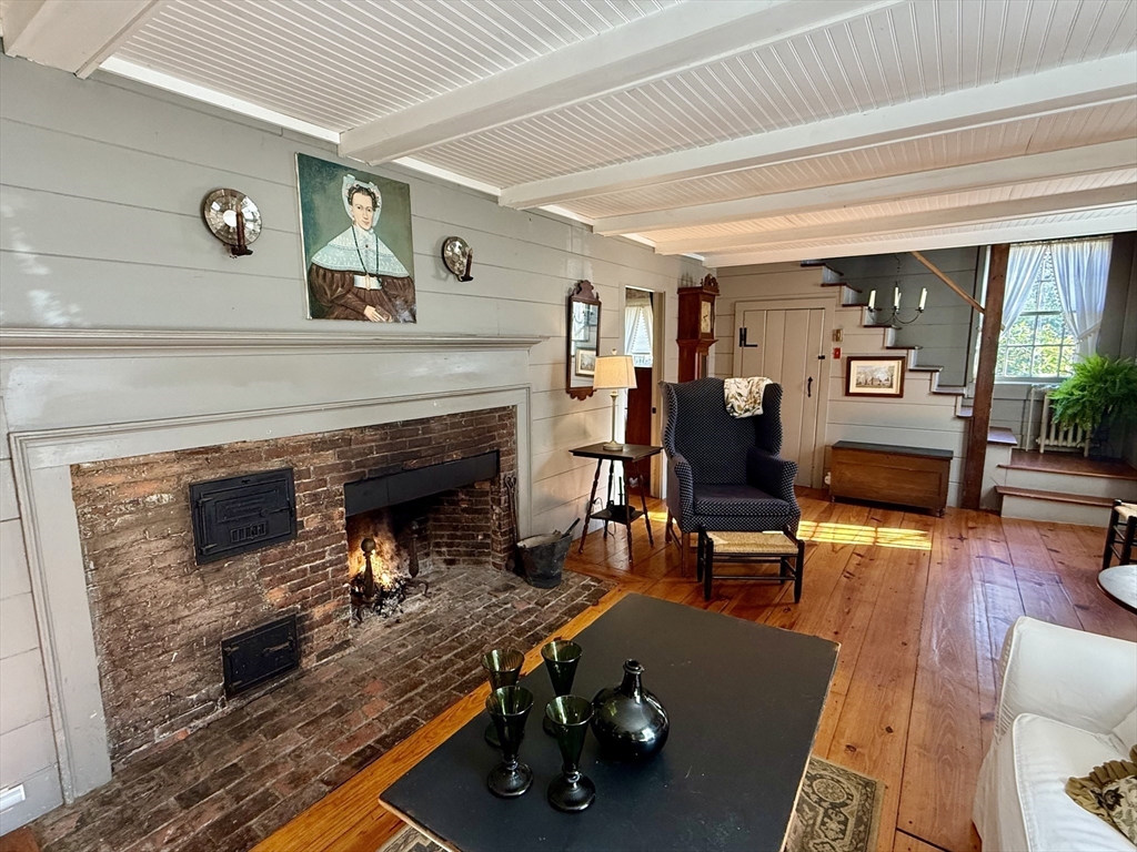 285 Brookfield Road Sturbridge, MA 01518 - Photo 3 of 42 a living room with furniture and a fireplace