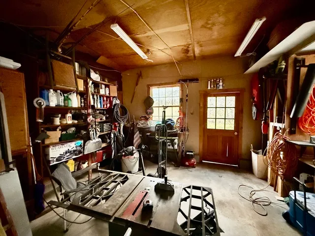 a house with swimming pool in front of it