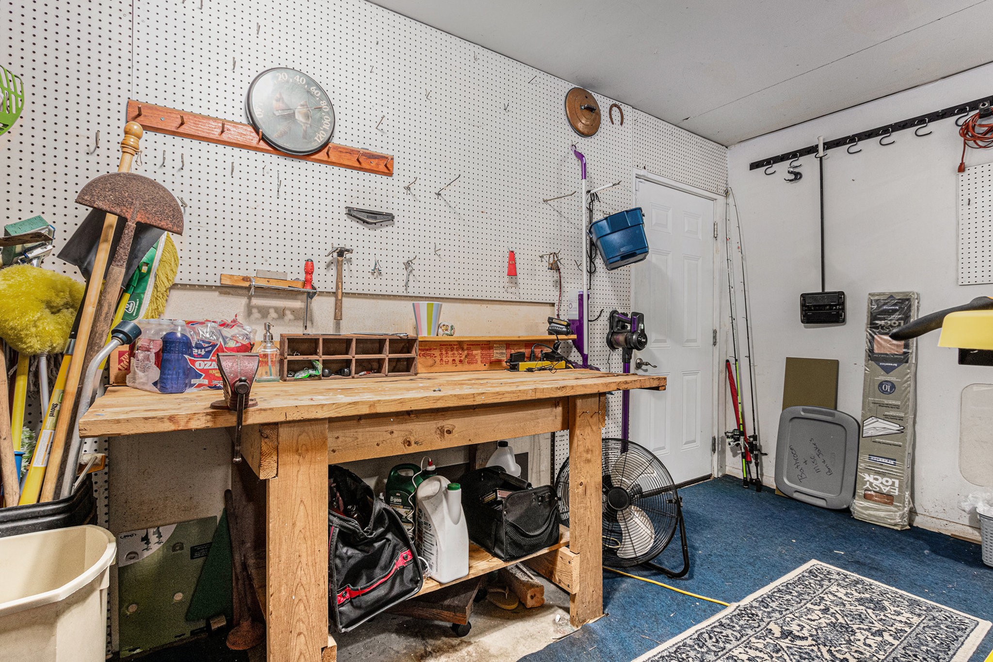 8019 Sharpview Drive Houston, TX 77036 - Photo 16 of 40 This is the work/storage room past the utility room. Door leads to back/side yard.