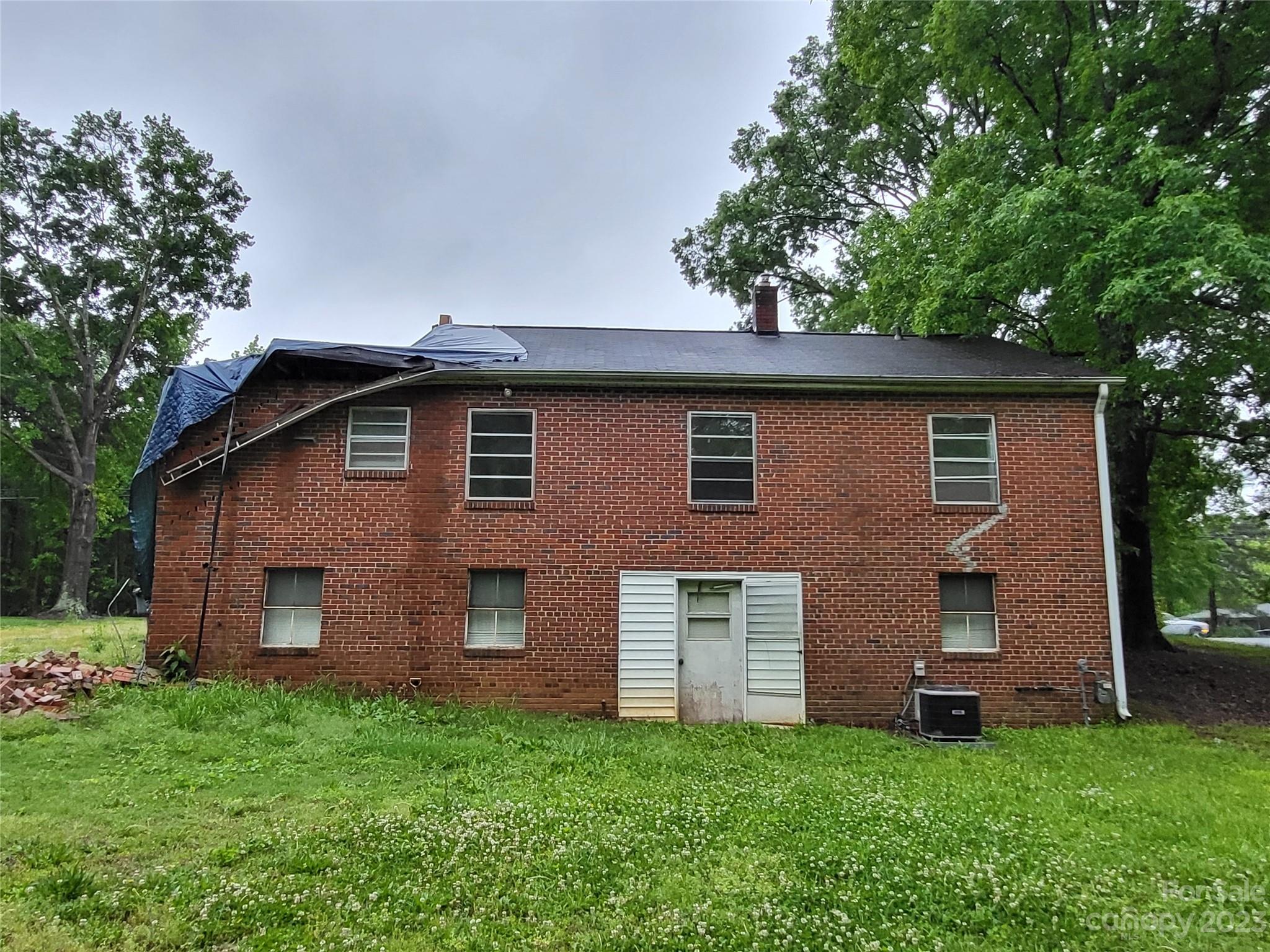 708 Tom Sadler Road Charlotte, NC 28214 - Photo 13 of 16 a view of a house with a yard