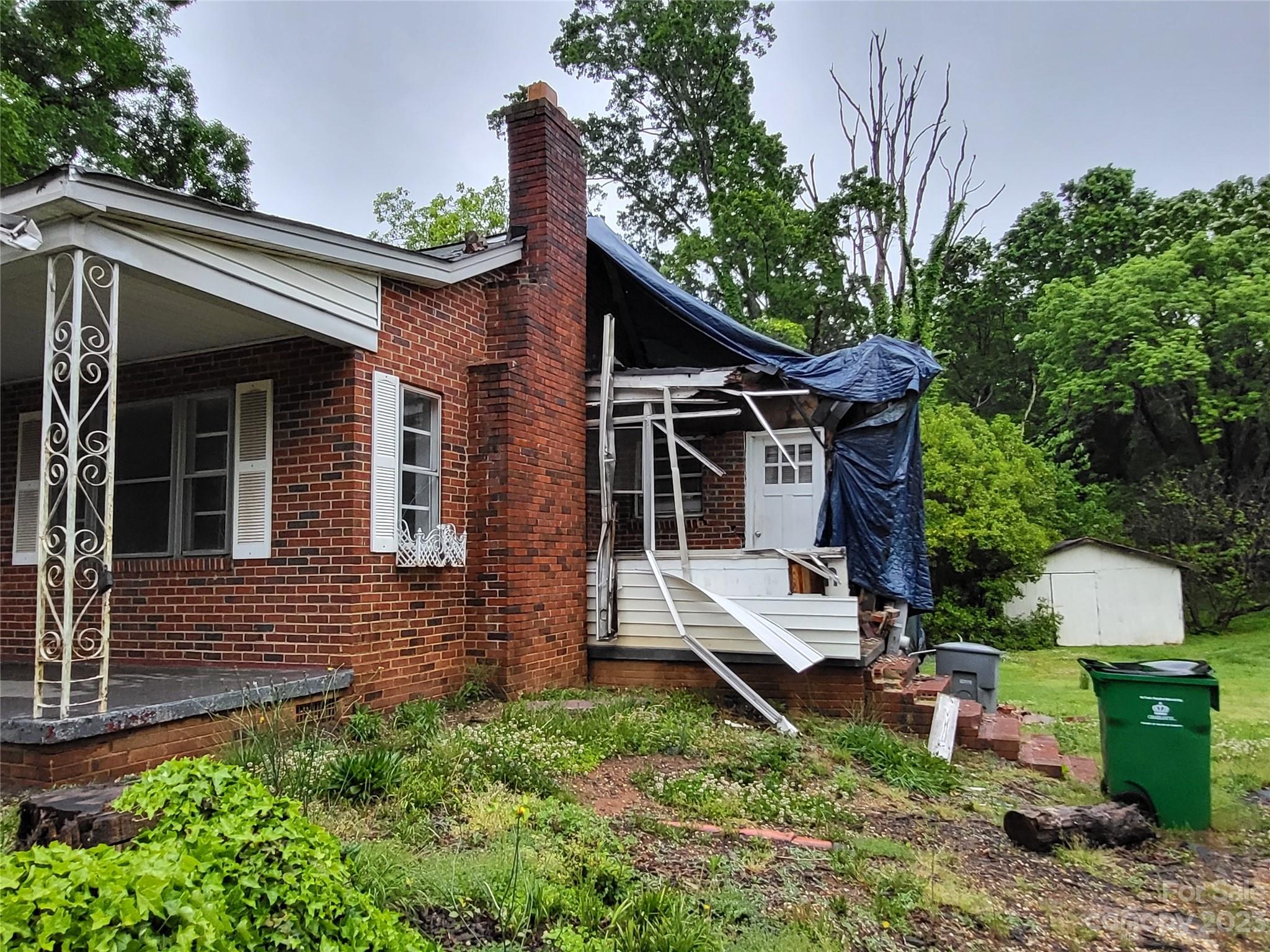 708 Tom Sadler Road Charlotte, NC 28214 - Photo 3 of 16 a front view of a house with garden