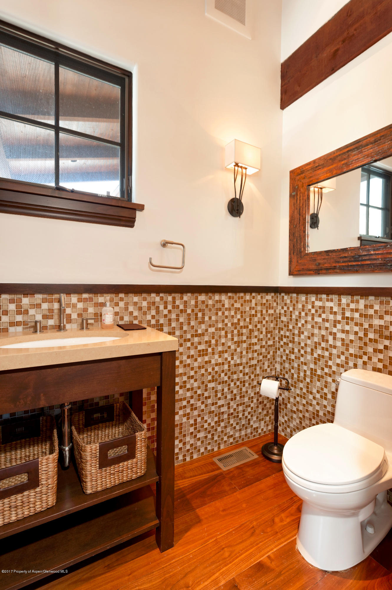 566 Race Street Aspen, CO 81611 - Photo 14 of 26 a bathroom with a toilet and a mirror