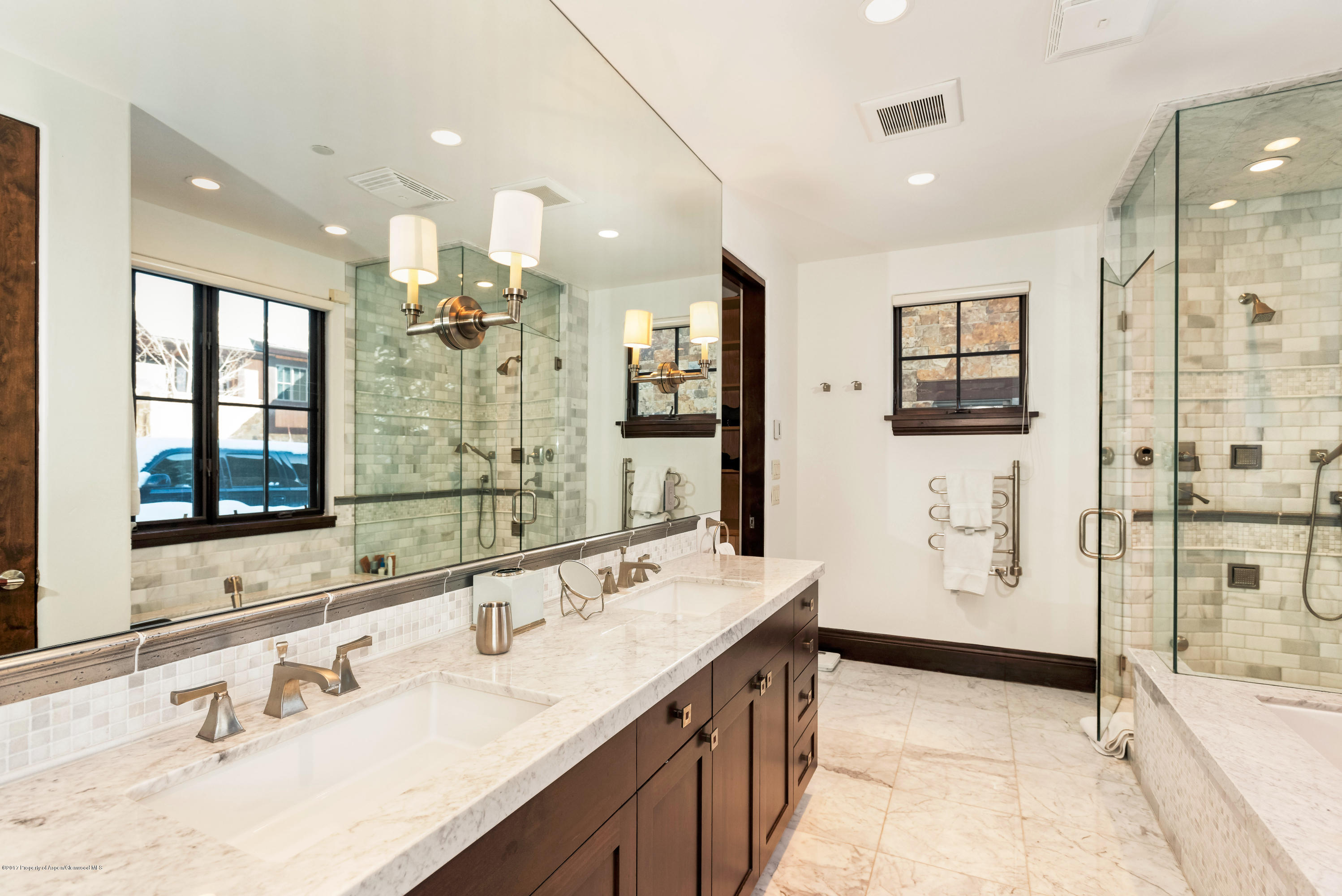 566 Race Street Aspen, CO 81611 - Photo 16 of 26 a bathroom with a granite countertop sink mirror and a shower