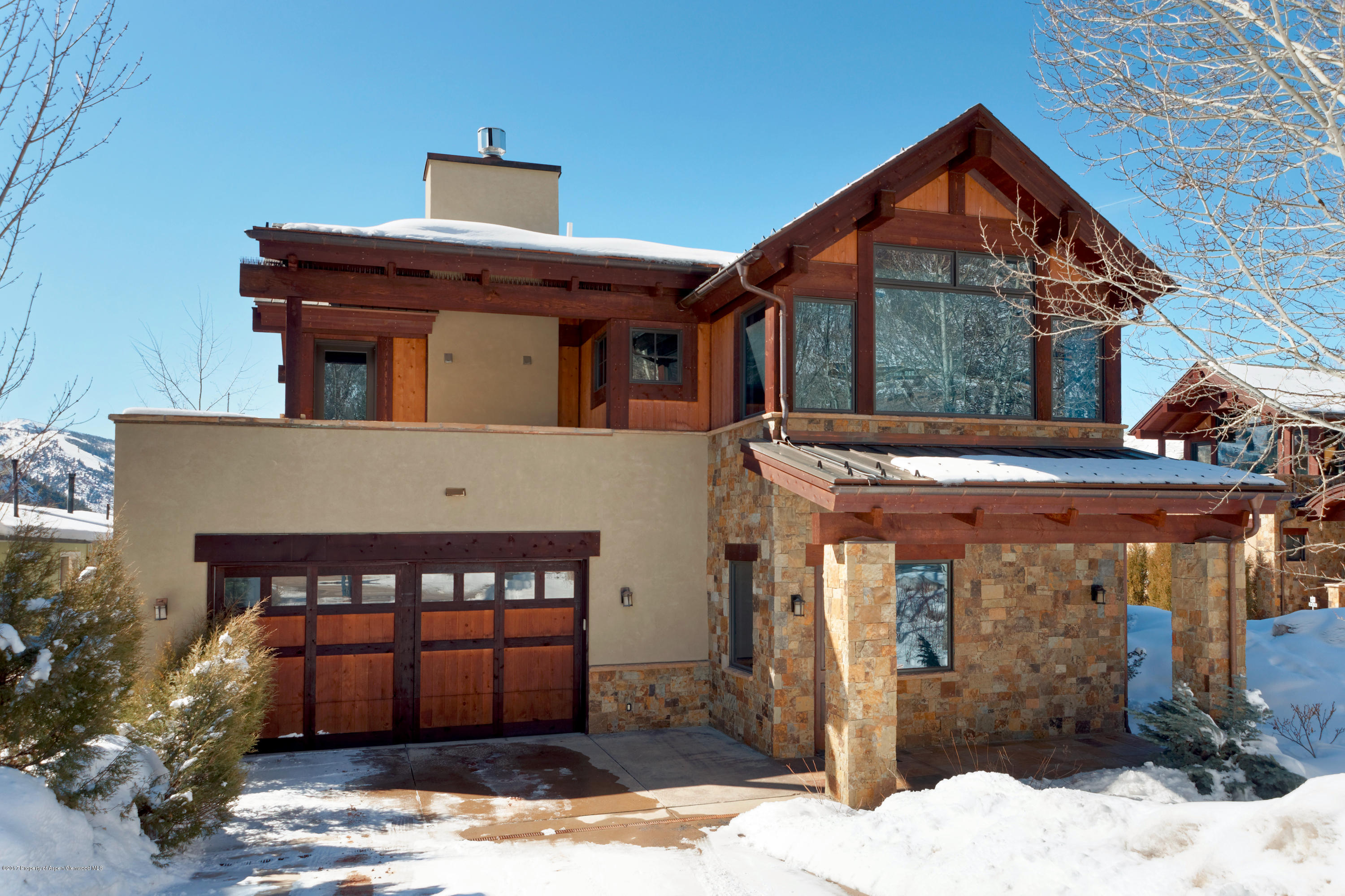 566 Race Street Aspen, CO 81611 - Photo 2 of 26 a front view of a house