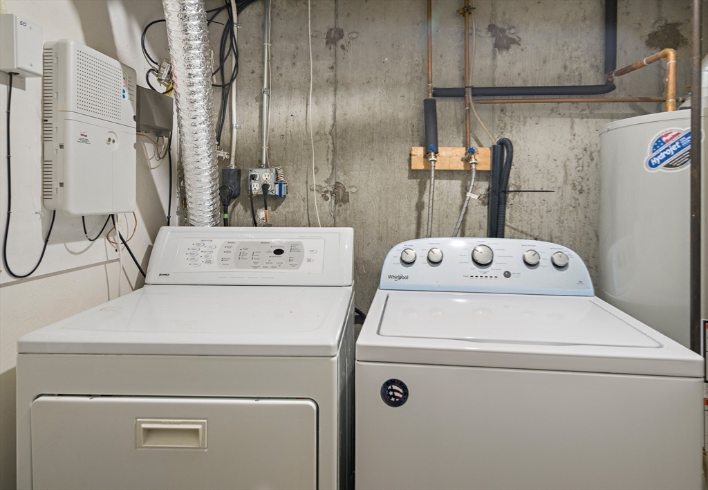 73 Half Crown Circle, Unit 73 Ashland, MA 01721 - Photo 20 of 25 a utility room with dryer and washer