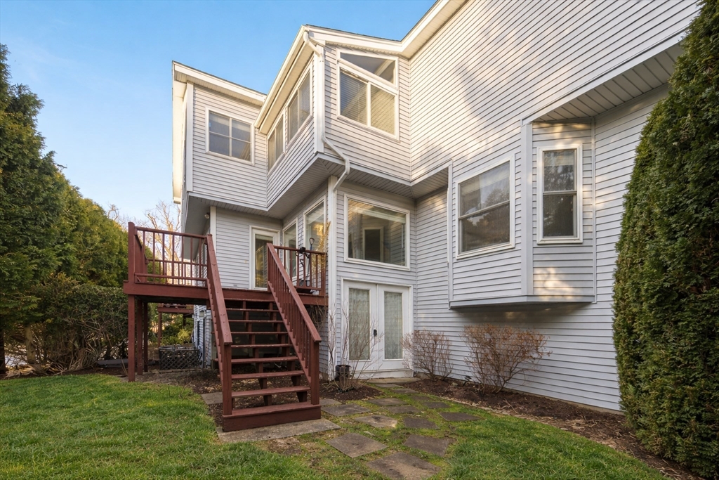 73 Half Crown Circle, Unit 73 Ashland, MA 01721 - Photo 2 of 25 a view of a house with a yard
