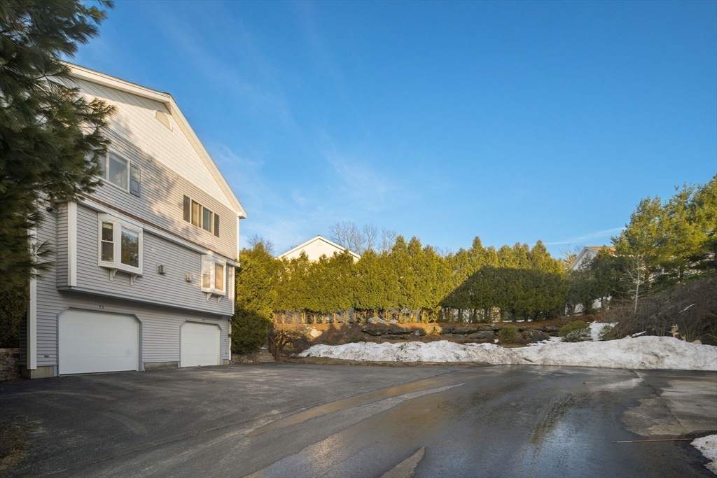 73 Half Crown Circle, Unit 73 Ashland, MA 01721 - Photo 23 of 25 a view of a street in front of a house