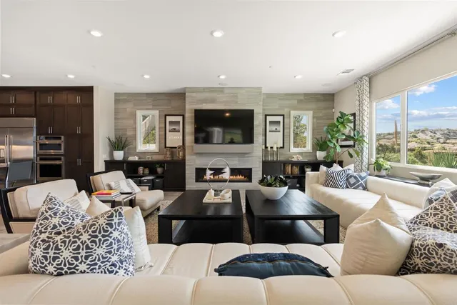 a kitchen with a sink and dishwasher a stove top oven with wooden floor