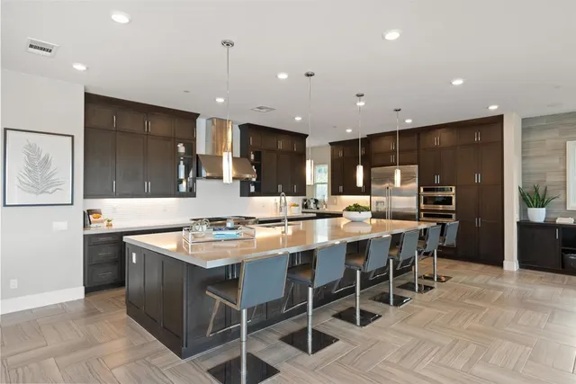 a living room with furniture potted plant and a window