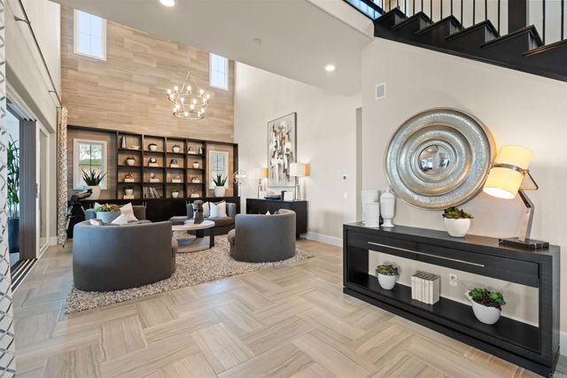 a spacious bathroom with a double vanity sink a large mirror a shower and a bathtub