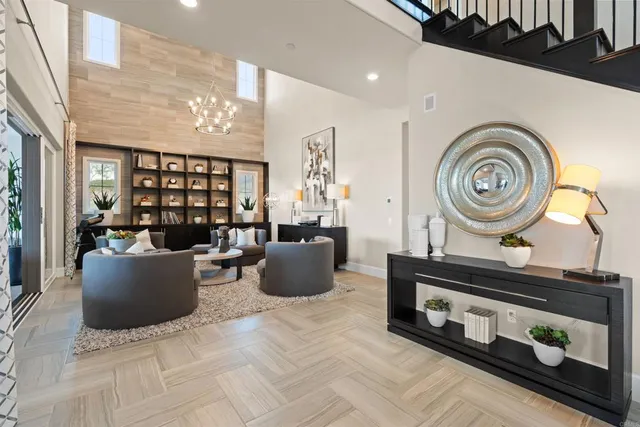 a spacious bathroom with a double vanity sink a large mirror a shower and a bathtub