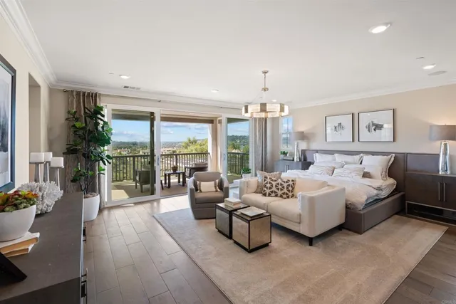 a view of swimming pool with furniture and a fire pit