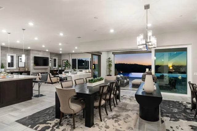 a view of a dining area with furniture window and outside view