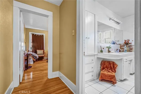 a very nice looking room with wooden floor