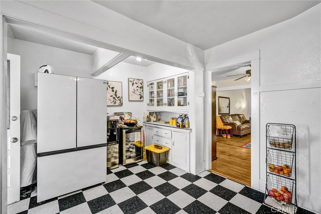 833 South Lemon Street Anaheim, CA 92805 - Photo 20 of 49 a kitchen with a refrigerator and cabinets